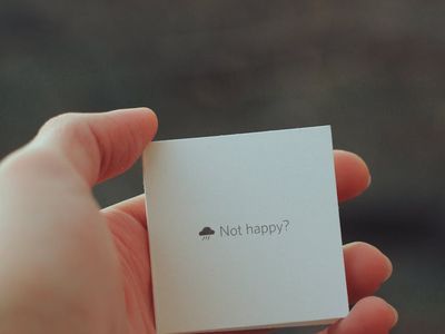 Close-up on a person's calm expression, suggesting focus on breathing.